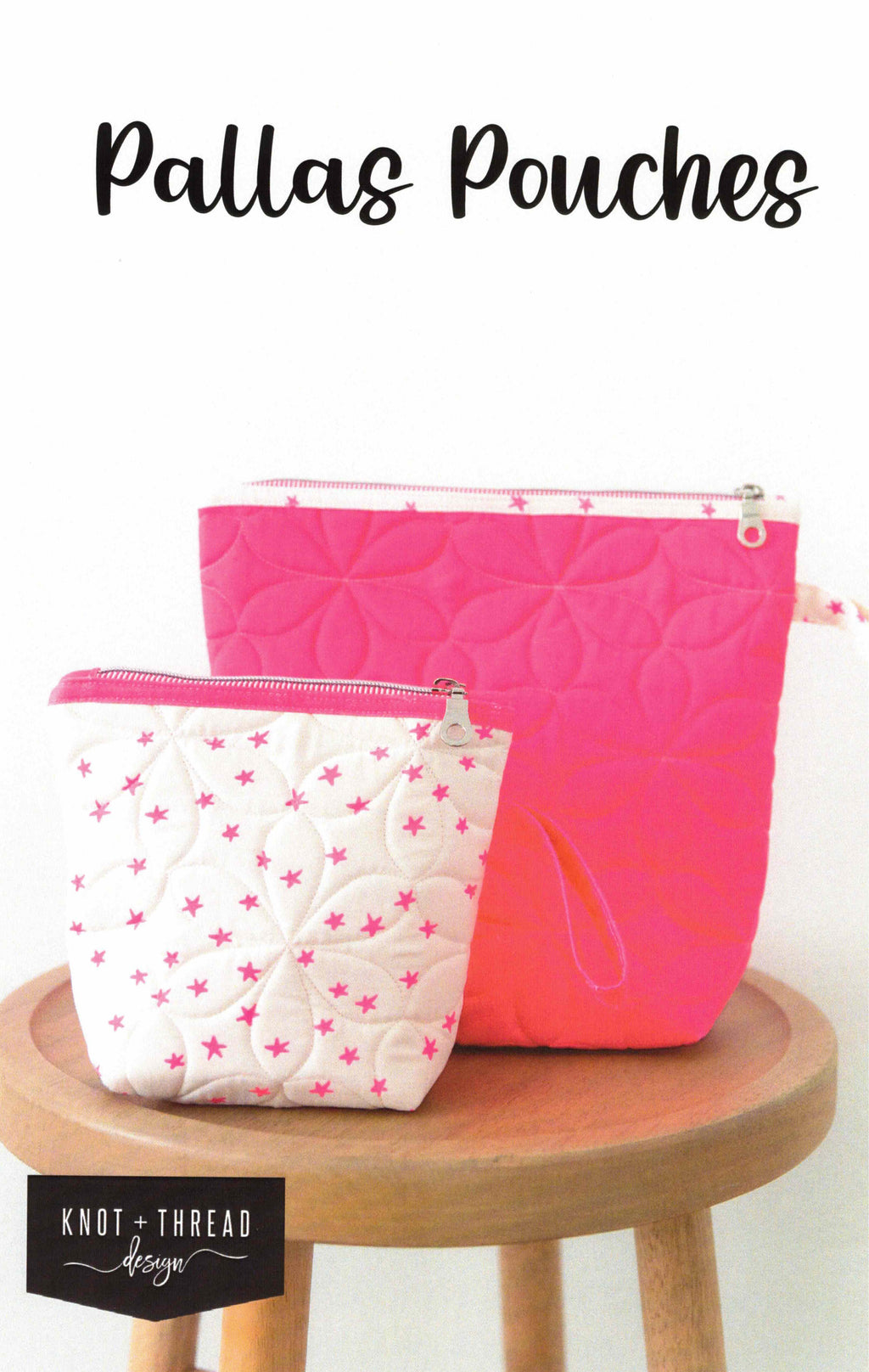 Two quilted pouches, one pink and one white with pink stars, on a wooden stool with 'Knot & Thread Design' branding.