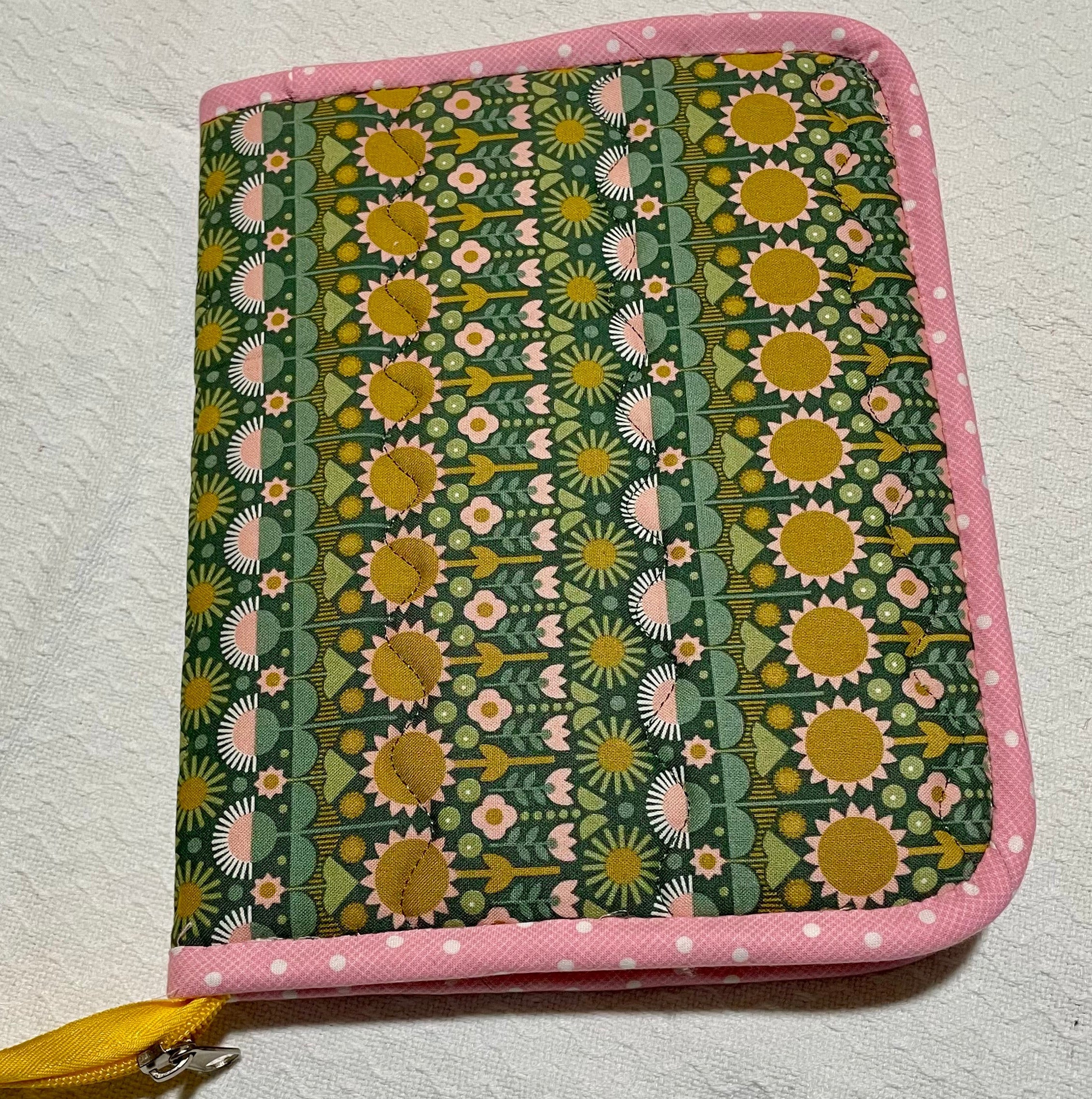 Fabric pouch with floral pattern on a white background