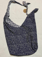 Floral-patterned face mask on a light background