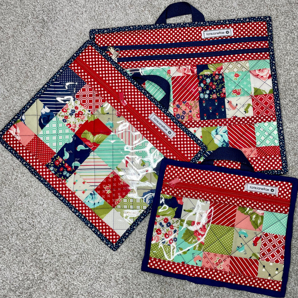 Set of patchwork-style potholders with various patterns on a gray surface