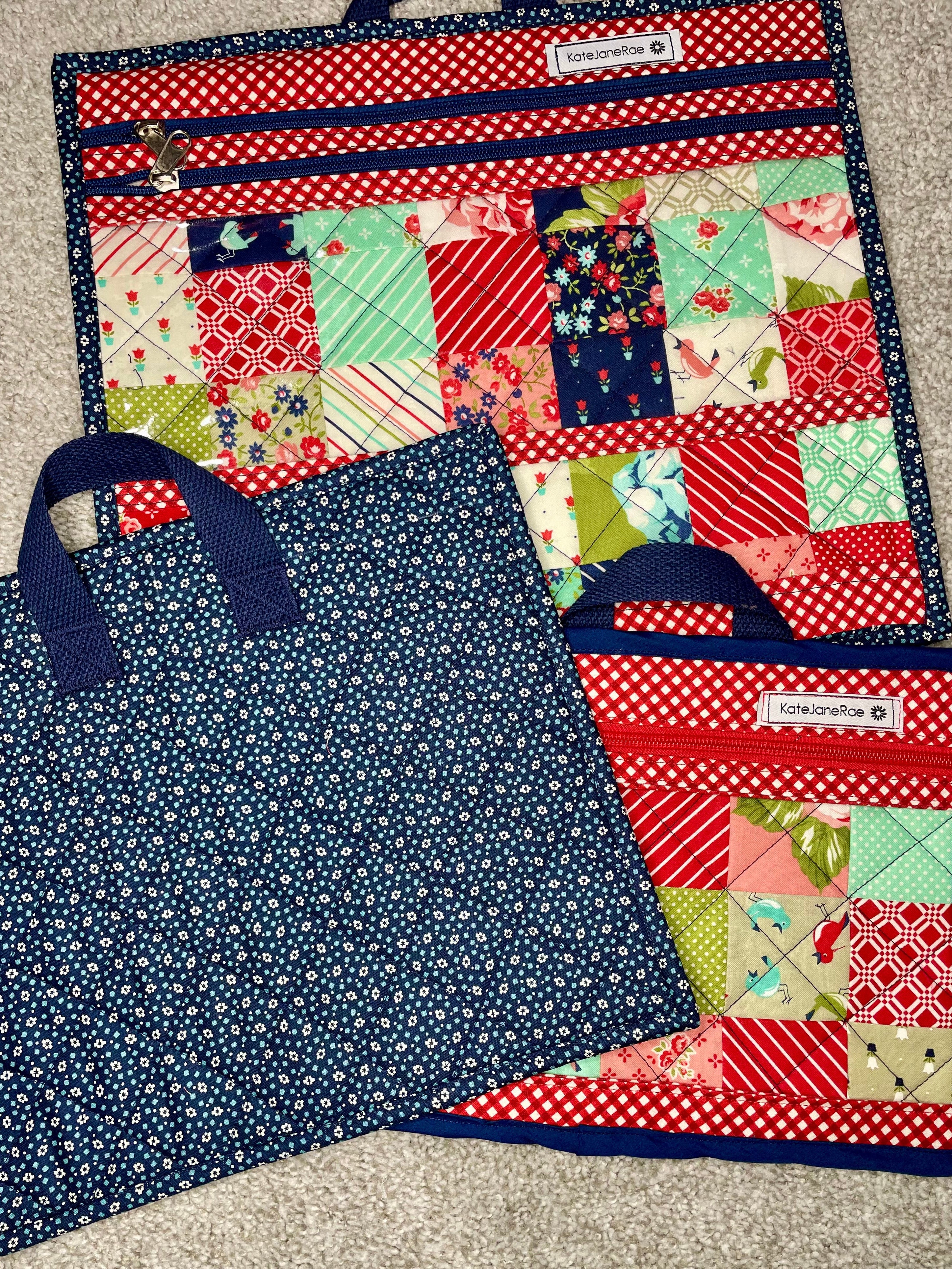 Two fabric items with patchwork designs and blue floral patterns on a gray surface.