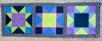 Quilted table runner with geometric pattern on a checkered background