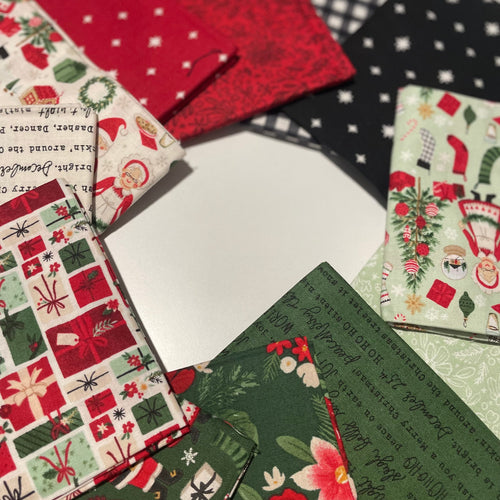 Collection of Christmas-themed fabric with various designs.