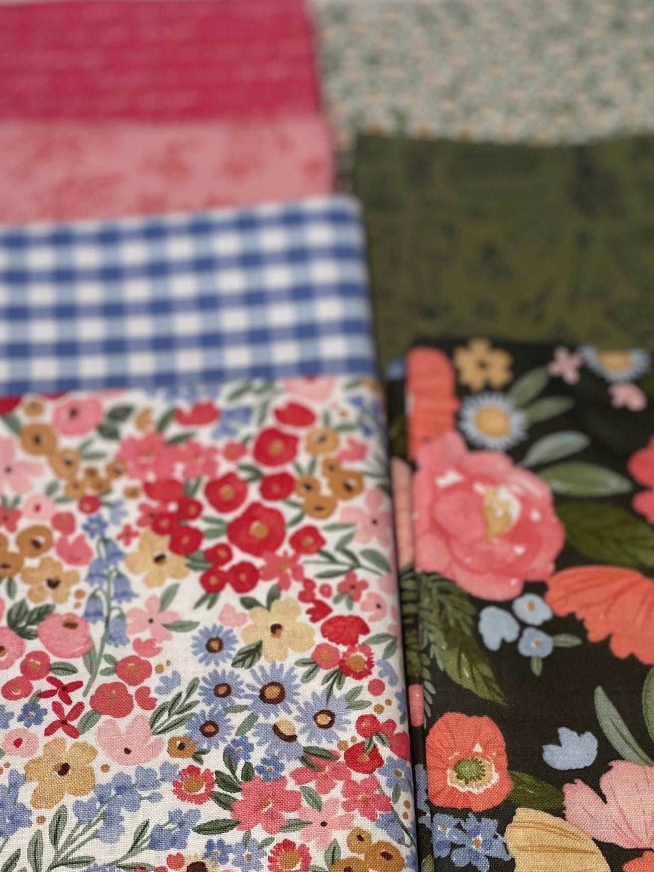 Collection of fabric swatches with various patterns on a white background