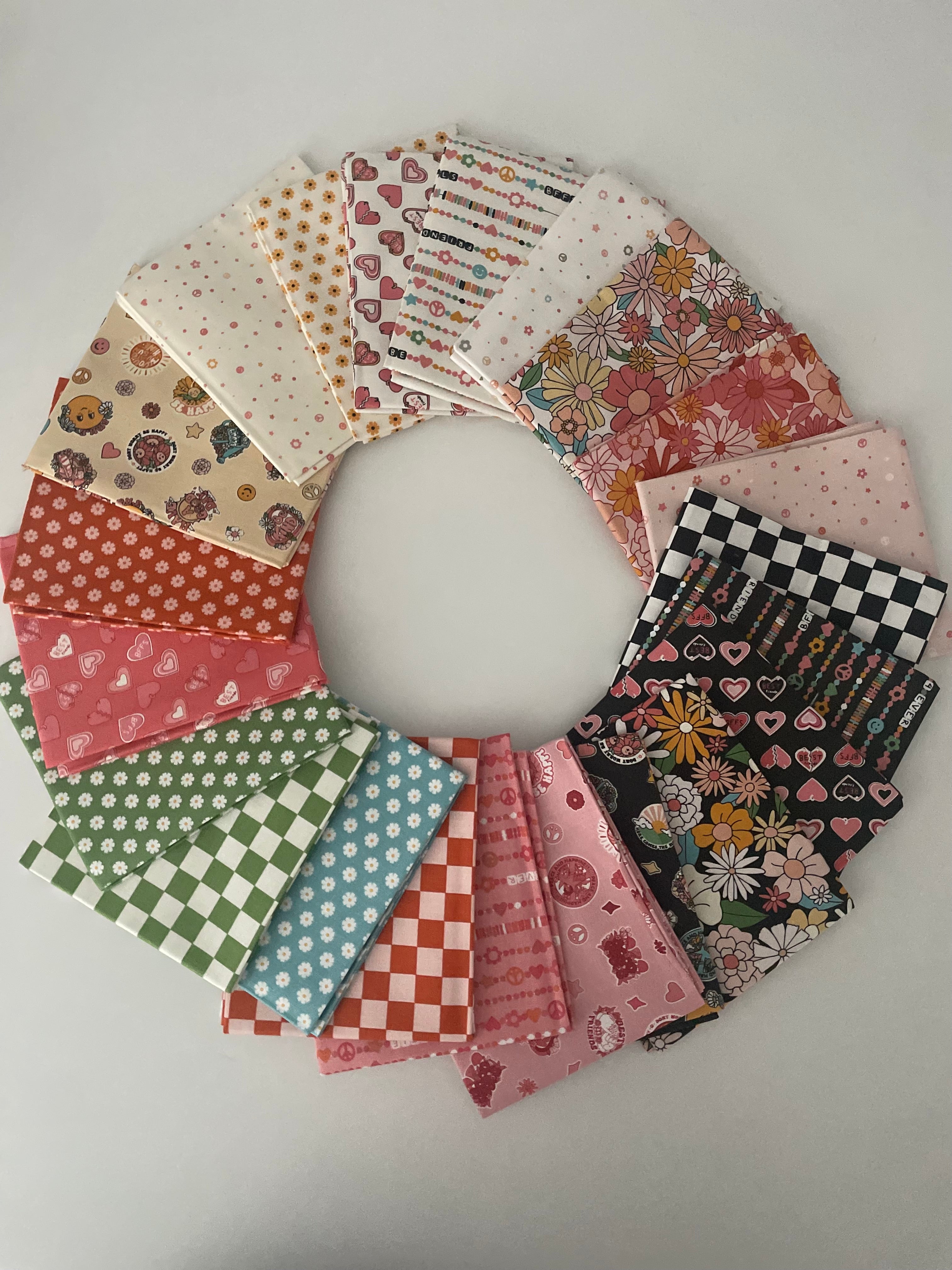 Circular arrangement of patterned fabric squares on a light gray background