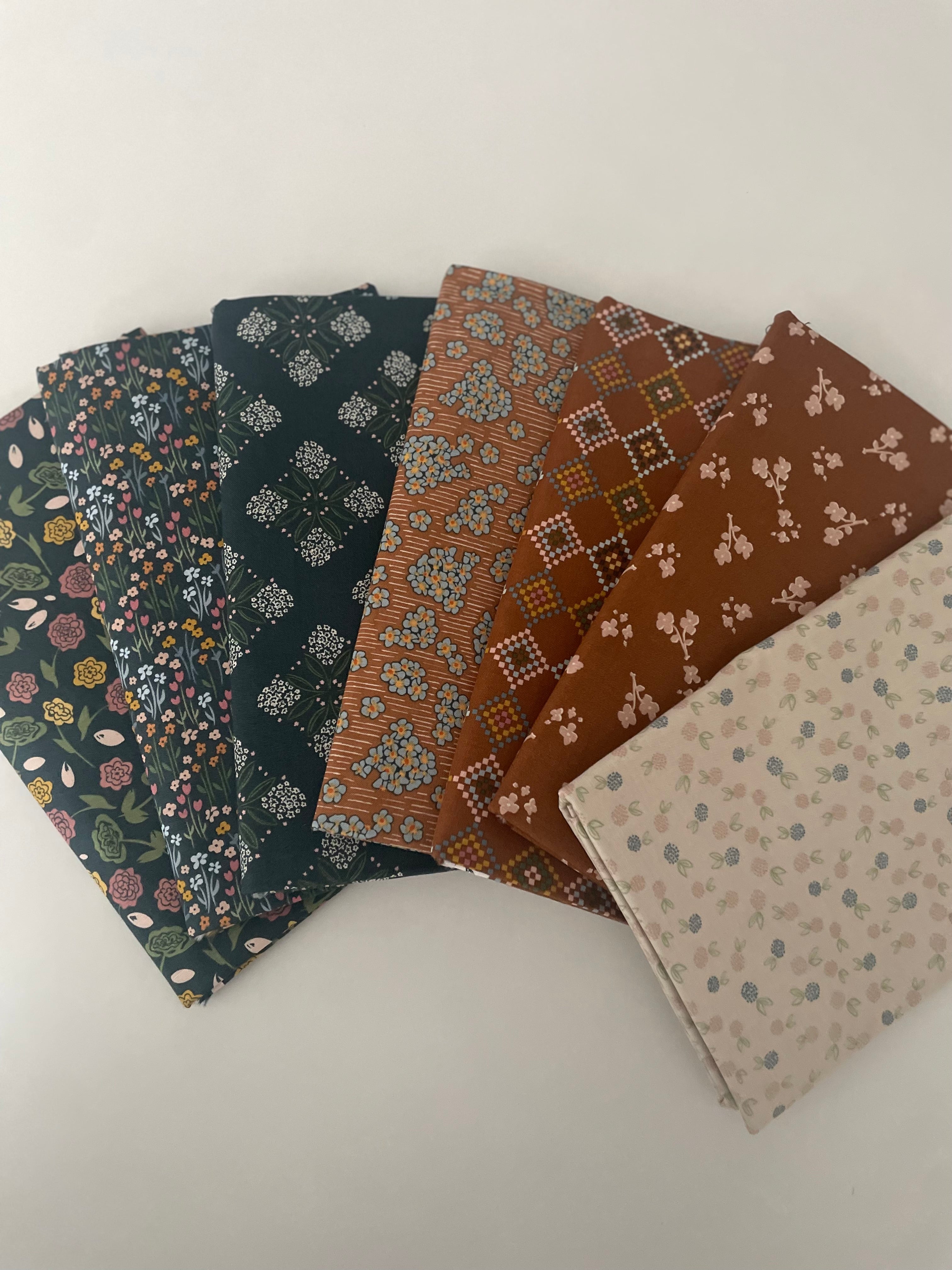 Collection of patterned fabric swatches on a white background