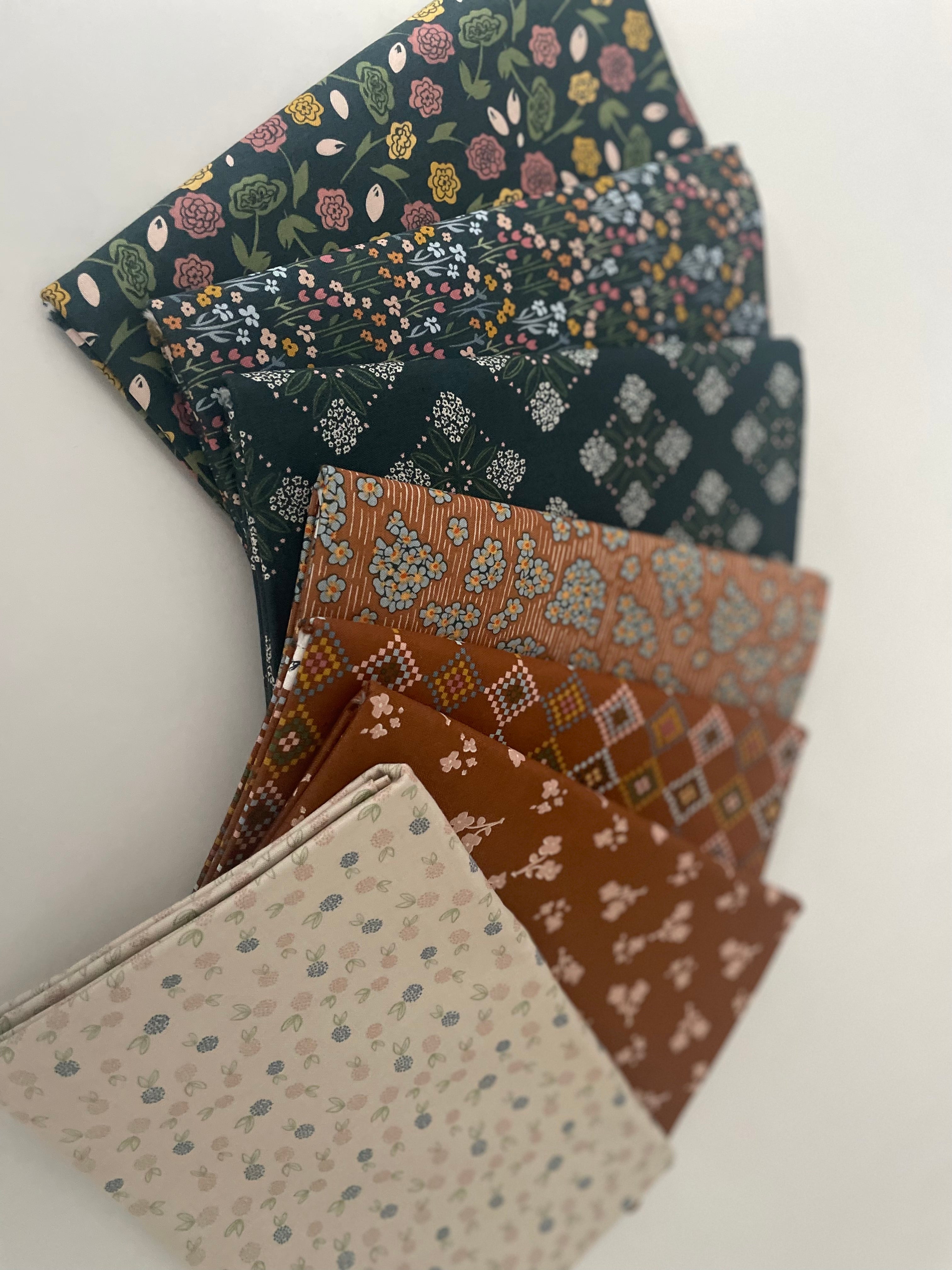 Collection of patterned fabric squares on a white background