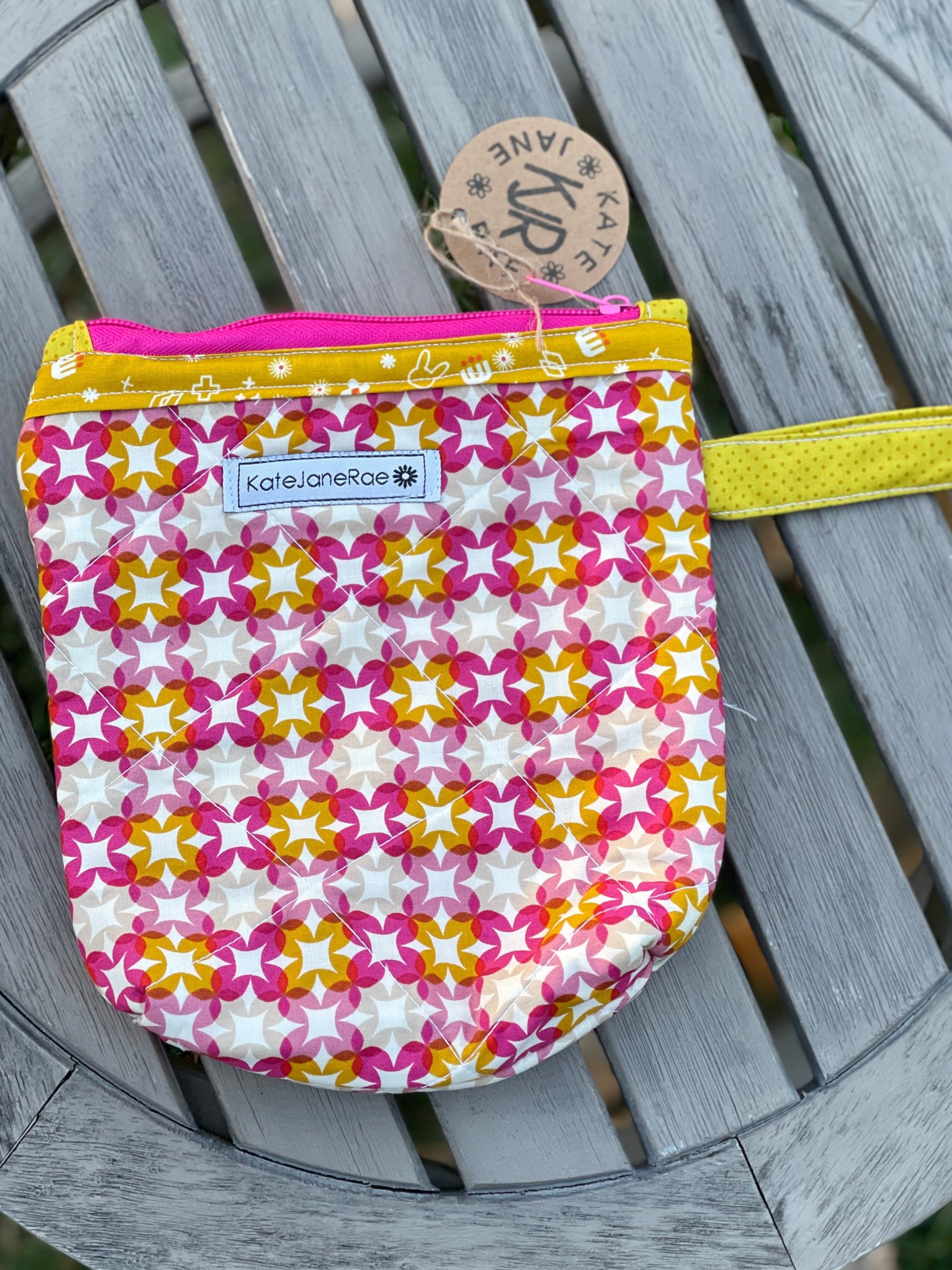 Small pouch with star pattern on a wooden surface