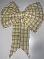 Large checkered bow on a plain background