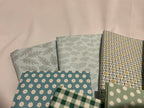 Collection of patterned fabric swatches on a neutral background